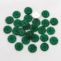 Macro detail of 12mm green resin round faceted pineapple cut cabochons with silver flat back - Dark Green (G7-35)