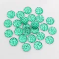 Detailed view of 12mm mint green resin druzy cabochons with sparkling faceted texture - Mint Green (Z6-08)