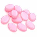 Macro detail of oval pink resin stones with cat eye effect for DIY jewelry making - Pink Style (T4-26)