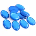 Detailed view of polished blue oval resin cabochons for DIY jewelry making - Sky Blue Style (T4-28)