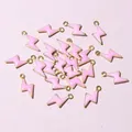 Macro shot of small pink enamel and gold lightning bolt pendants for DIY jewelry making - Pink (E2-100)