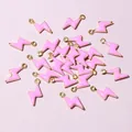 Detailed view of pink enamel lightning bolt charms for DIY jewelry making and crafts - Hot Pink (E2-104)