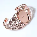 Detail van roségouden filigraan armband met ovale bezelzetting voor doe-het-zelf sieraden - Roségoud