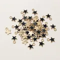 Star-shaped black enamel pendant with gold metal frame and hanging loop for DIY jewelry - Black