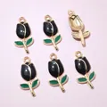 Detail of tulip pendant charms with black petals and gold edges for DIY jewelry making - Elegant Black Style (AI6-34)