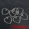 Versilberte Herz-Anhänger aus Legierung für DIY-Schmuck mit Maßen 22x21mm - Doppelschleifen-Hohlherz-Stil (R7-39)