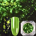 Macro-opname van groene glitter nagelfolie vlokken in een potje voor DIY manicure - Smaragdgroen (CB04)