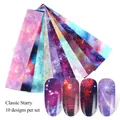 Detailed set of 10 starry sky nail foil transfer stickers with galaxy nebula patterns - Classic Night Sky Style