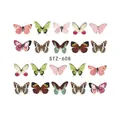 Pegatinas STZ-608 para uñas con 20 diseños de mariposas coloridas sobre fondo blanco - STZ608
