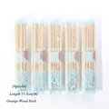 50-piece set of 11.3cm orange wood sticks for nail care in lace patterned packaging - Medium-Professional Style