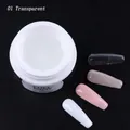 Set gel di estensione in barattolo bianco con quattro punte per unghie colorate su nero - Gel per extension / Trasparente