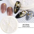 Detailed view of flatback white nail art pearls in a six-grid box with multiple sizes - Flatback Half Round Style (A) / White