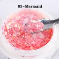 Makroaufnahme von Mermaid 03 pinkem irisierendem Opal-Glitzer und Edelstahl-Werkzeug - Meerjungfrau (03)