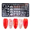 Christmas nail art stamping plate STZ-FB19 with snowflakes and holiday patterns - Stiletto Nail Effect Display (FB-19)