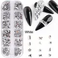 Detail of 12-grid nail art kit with silver rhinestones in heart, star, and moon shapes - 12-Grid White Special-Shaped Rhinestones (1897-White)