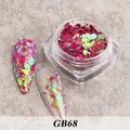 Detailed view of magenta and neon green hexagonal nail sequins in a clear jar GB68 - Bottled Glitter Gb68