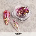 Macro shot of GB77 pink laser hexagonal nail glitter flakes in a square clear jar - Bottled Glitter Gb77