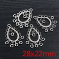 Macro view of teardrop alloy pendants with vintage hollow patterns, size 28x22mm - Waterdrop Hollow Style (P7-32)