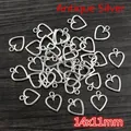 Detailed close-up of antique silver hollow heart charms for DIY jewelry 14x11mm - Rounded Heart (14x11mm) / Antique Silver Style (AC3-37)