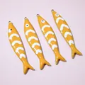 Macro detail of four orange fish enamel charms for DIY jewelry making accessories - Orange Style (E6-76)