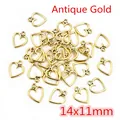 Detailed view of antique gold hollow heart alloy pendants sized 14x11mm for DIY jewelry - Rounded Heart (14x11mm) / Antique Gold Style (AC3-38)
