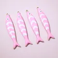 Close-up of four pink enamel fish charms with golden finish for DIY jewelry making - Pink Fish Style (E6-77)