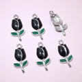 Detail of tulip pendants with black enamel flower and green leaf for DIY jewelry making - Black