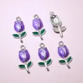 Detail of purple tulip charms with green leaves and silver metal frame for DIY jewelry - Purple