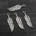 Set of 4 vintage alloy feather pendants in antique silver for DIY jewelry making - Antique Silver