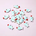 Detailed view of colorful fish-shaped stainless steel charms for DIY jewelry making - Mint Green Striped Fish (E6-59)