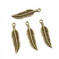 Set of four antique bronze alloy feather pendants for DIY jewelry making accessories - Bronze