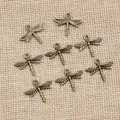 Set of 8 vintage bronze alloy dragonfly pendants for DIY necklaces and bracelet crafts - Bronze