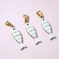 Close-up of three gold-plated small fish pendants with white enamel for DIY jewelry - White Style(E6-80)