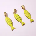 Close-up of three yellow enamel fish pendants with golden metal stripes for DIY jewelry - Yellow Style(E6-81)