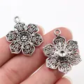Vintage silver alloy flower pendant with hollow spiral pattern for DIY jewelry making - Antique Silver