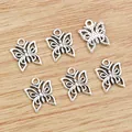 Vintage silver butterfly alloy pendants with hollow wings and textured back for DIY jewelry - Antique Silver