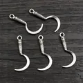Five vintage silver alloy scythe pendants with skull carvings for DIY jewelry making - Antique Silver