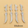 Detail view of 59x8mm antique silver alloy sword charms with honeycomb texture - Honeycomb Pattern Scimitar Style (E4-30)