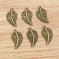 Set of 6 vintage bronze alloy leaf pendants with hollow veins for DIY jewelry making - Bronze