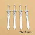 Detail of four vintage silver sword alloy pendants measuring 69x11mm for DIY jewelry - Carved Hollow Fantasy Sword Style (E4-32)