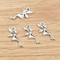 Set of four antique silver fairy elf charms for DIY jewelry making on wood background - Antique Silver