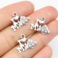 Antique silver I Love My Dog heart pendant shown in hand for scale and detail - Antique Silver