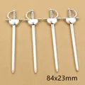 Detail view of four antique silver alloy sword charms measuring 84x23mm for DIY jewelry - Semicircle Shield Guard Straight Sword Style (E4-36)