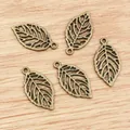 Set of five retro bronze leaf pendants with hollow vein design for DIY jewelry - Bronze
