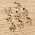 Antique bronze cat shaped alloy pendants for DIY jewelry making crafts 19x14mm - Bronze
