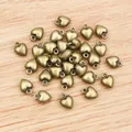 3D heart alloy charms for DIY jewelry making in antique bronze finish with closed ring hooks - Bronze