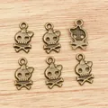 Set mit 6 Totenkopf-Anhängern aus Bronze mit Schleife für DIY-Schmuckherstellung - Bronze