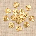 Gouden legering knophangers voor DIY sieraden maken in een verspreide lay-out - Goud