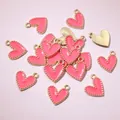 Detailed macro view of pink heart-shaped alloy pendants with gold beaded edges for DIY jewelry - Pink (AJ5-01)