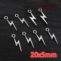 Close-up of lightning bolt alloy pendants in silver for DIY jewelry making 20x5mm - Lightning Shape (E5-17)